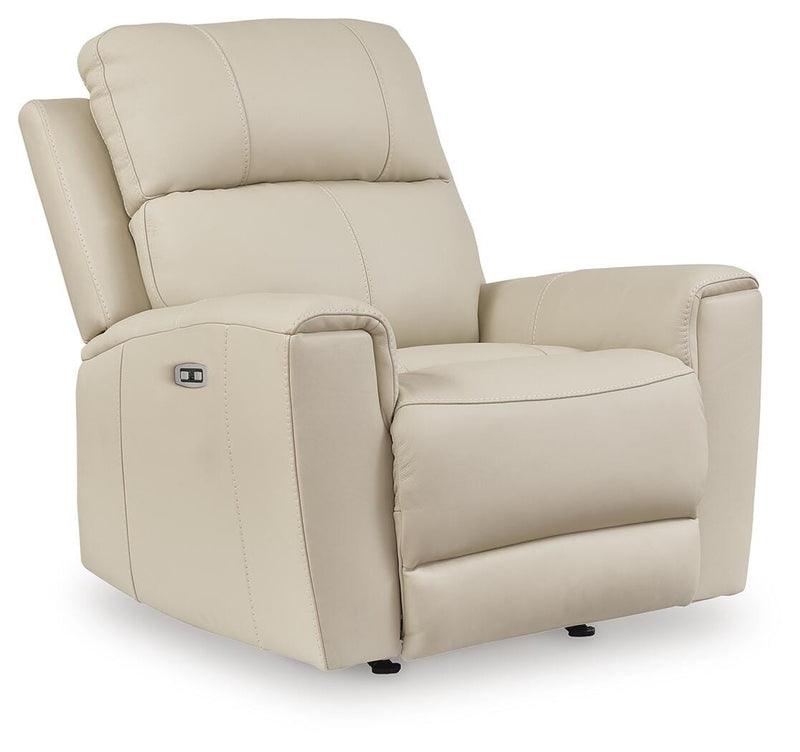 Ashley Furniture Dahlmoore power recliner in dark upholstery, shown from an angled view with closed recline and plush cushioning.