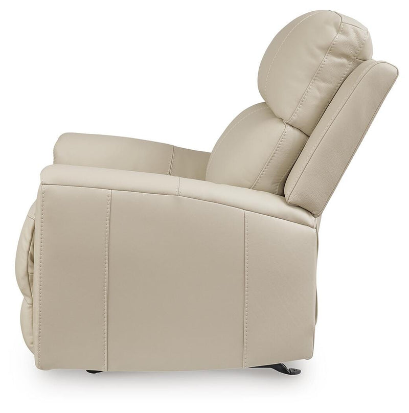 Ashley Furniture Dahlmoore power recliner in beige fabric, showing side view with plush cushioning and recline mechanism.