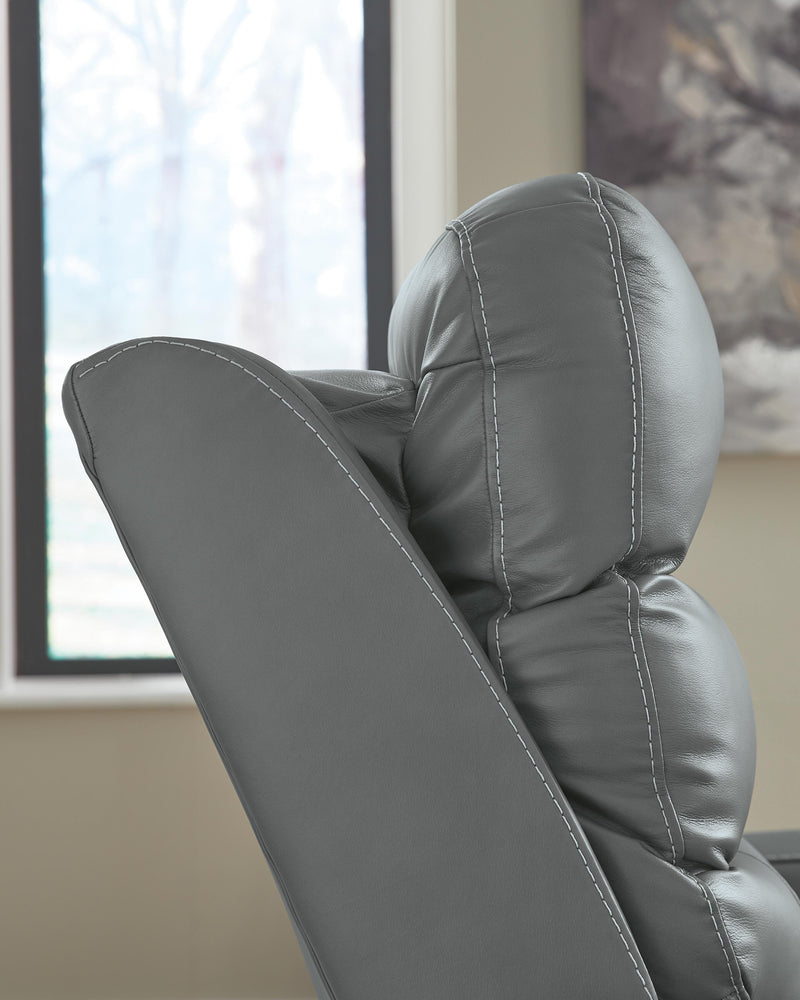 Ashley Furniture Pennacle Pier Power Recliner with adjustable headrest, plush upholstery, and modern design.