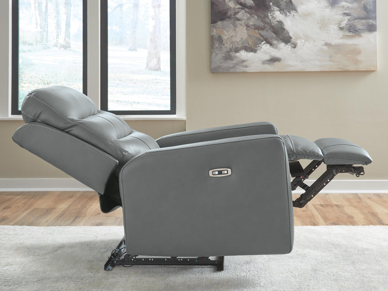 Ashley Furniture Pennacle Pier power recliner in a neutral fabric, shown in a laid-flat reclining position.