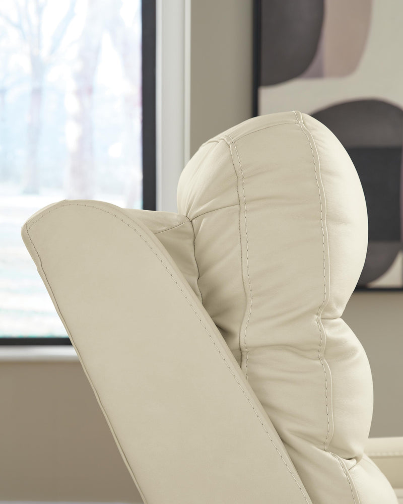 Ashley Furniture Pennacle Pier power recliner with adjustable headrest and plush upholstery, shown in a cozy living room setting.