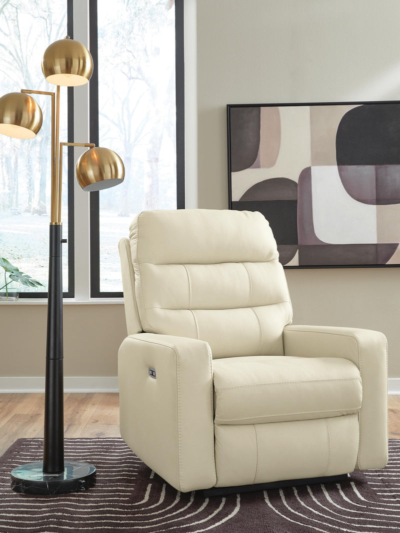 Ashley Furniture Pennacle Pier power recliner with plush cushioning and dark brown upholstery, shown in a closed reclining position.