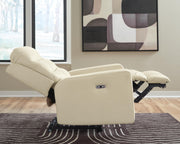 Ashley Furniture Pennacle Pier power recliner in a relaxed lying position, showcasing plush upholstery and modern design.