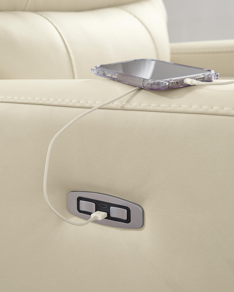 Ashley Furniture Pennacle Pier Power Recliner with USB port, shown in a comfortable, plush fabric with padded armrests and reclining feature.