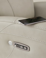 Ashley Furniture Pincara Power AutoGlide Recliner with heat, massage, and USB charging features in a plush, upholstered design.