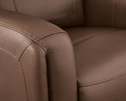 Ashley Furniture Pincara Power AutoGlide Recliner with jumbo stitching, featuring plush upholstery and a comfortable reclining design.