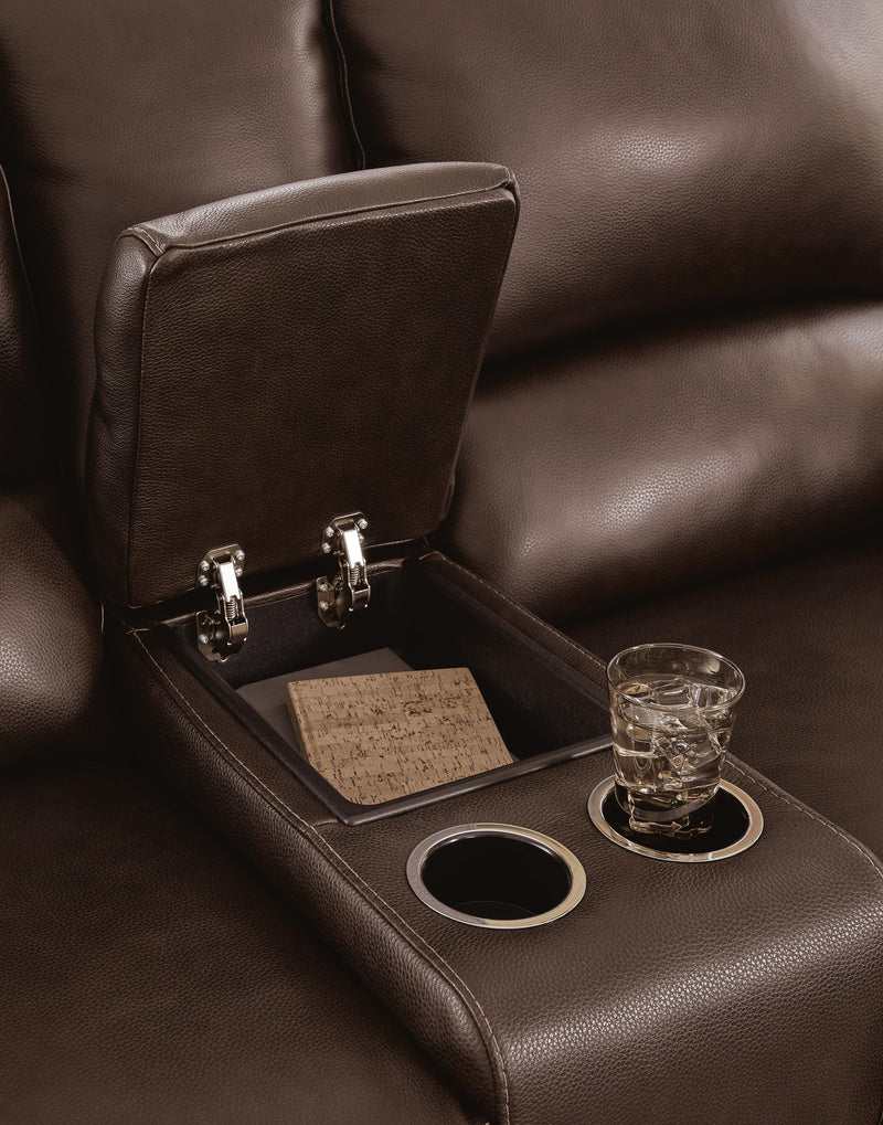 Close-up of the Alessandro power reclining loveseat with console from Ashley Furniture, showing plush upholstery and built-in cupholders