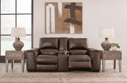 Ashley Furniture Alessandro Power Reclining Loveseat with Console, showing open position with plush cushions and built-in cup holders.