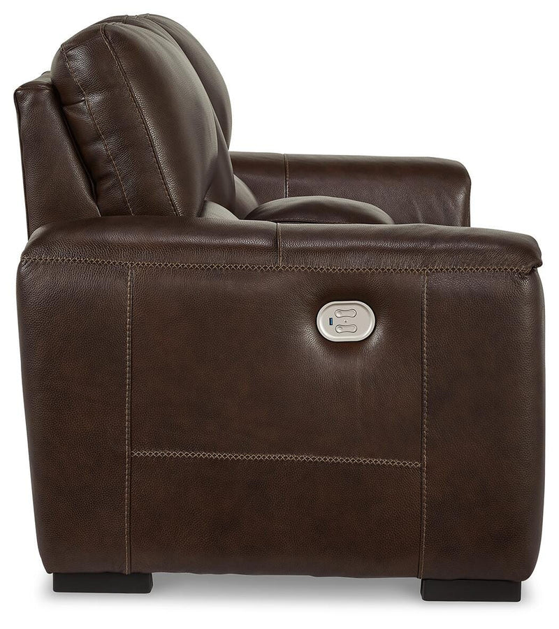Ashley Furniture Alessandro power reclining loveseat with console, showing plush fabric and built-in cup holders on the side.