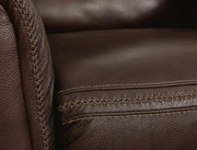 Ashley Furniture Alessandro Power Reclining Loveseat with Console, featuring stylish stitch detail and plush seating for comfort.
