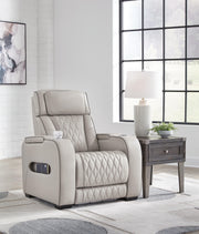 Ashley Furniture Boyington Power Recliner in closed position, plush fabric, and padded armrests for comfortable seating.