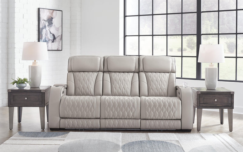 Ashley Furniture Boyington Power Reclining Sofa, showcasing plush fabric, reclining features, and comfortable seating.
