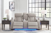 Ashley Furniture Boyington living room set featuring a plush sofa and armchair with neutral upholstery and modern design.