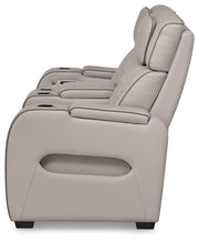 Ashley Furniture Boyington living room set with sofa and armchair, fabric upholstery, and decorative cushions.