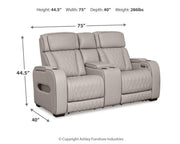Ashley Furniture Boyington living room set featuring a sofa and armchair with plush cushions and neutral upholstery.