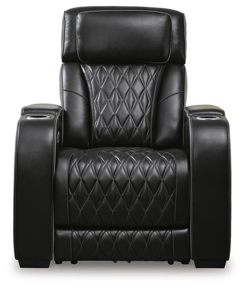 Boyington Power Recliner by Ashley Furniture, close-up view showing the plush fabric upholstery and reclining mechanism.