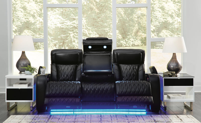 Ashley Furniture Boyington Power Reclining Sofa with plush cushions and dark upholstery, showing its comfortable, modern design.