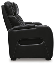 Ashley Furniture Boyington power reclining sofa shown from the side with plush cushions and a sleek design.