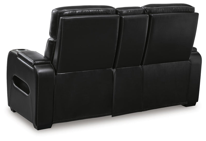 Ashley Furniture Boyington living room set with plush sofa and armchair, shown from the back in a cozy, stylish living space.
