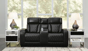 Ashley Furniture Boyington living room set with sofa and armchair, featuring neutral fabric and plush cushioning.