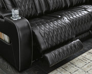 Ashley Furniture Boyington living room set featuring a sofa, armchair, and coffee table arranged in a modern living space