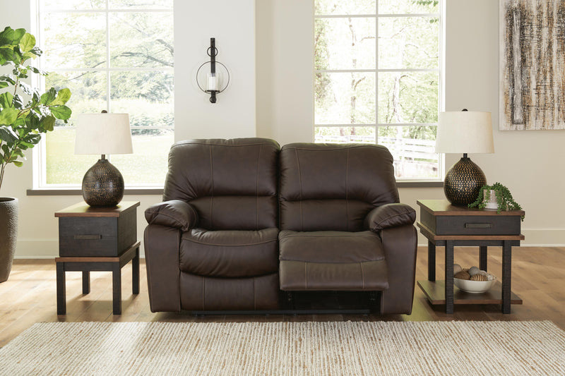 Ashley Furniture Leesworth living room set with a sofa and matching armchair in a modern design, shown in a cozy home setting.