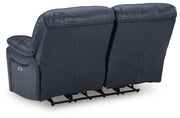 Ashley Furniture Leesworth living room set with a sofa and armchair, featuring neutral upholstery and cozy cushions.