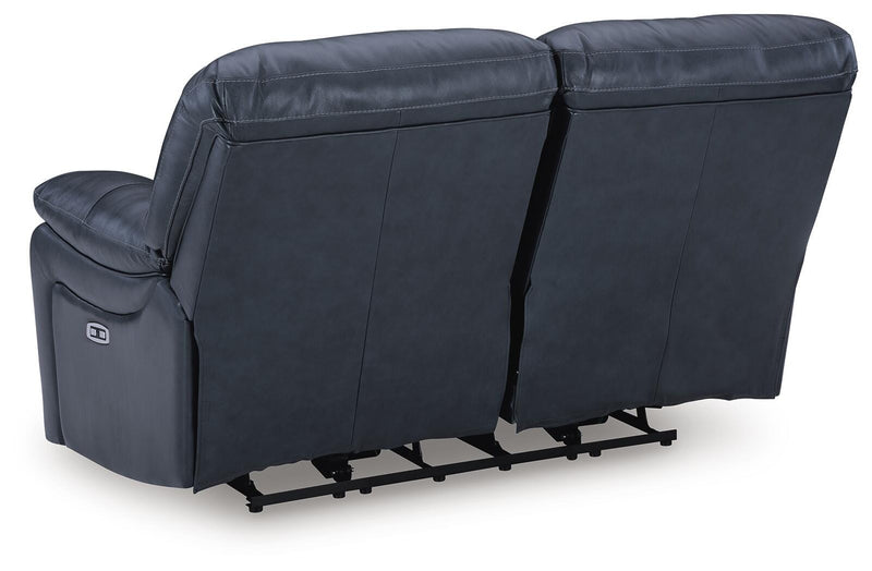 Ashley Furniture Leesworth living room set with a sofa and armchair, featuring neutral upholstery and cozy cushions.