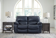Ashley Furniture Leesworth living room set with plush sofa and matching armchair in a modern living space.
