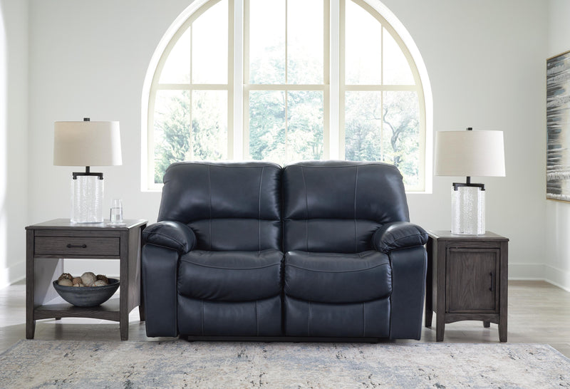 Ashley Furniture Leesworth living room set with plush sofa and matching armchair in a modern living space.