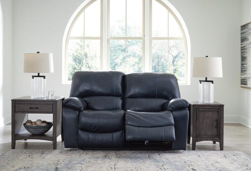 Ashley Furniture Leesworth living room set with sofa and armchair, featuring neutral upholstery and modern design.