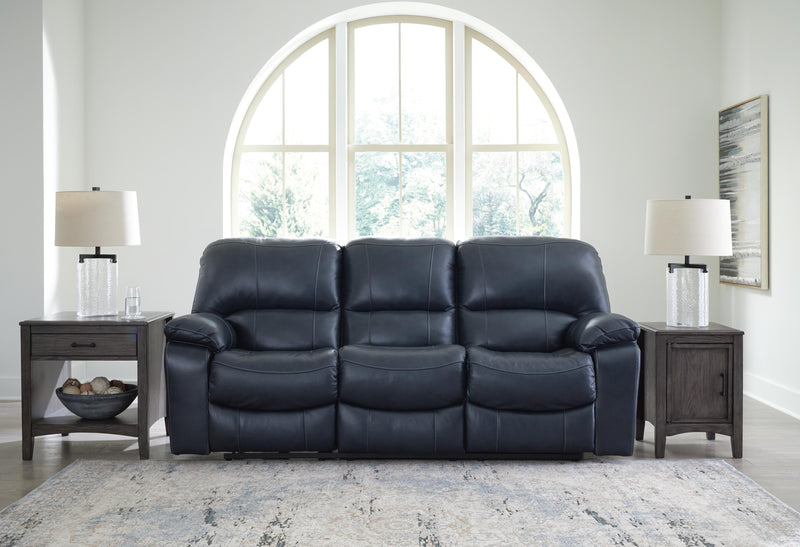 Ashley Furniture Leesworth living room set with plush sofa and matching loveseat, fabric upholstery, and decorative throw pillows.