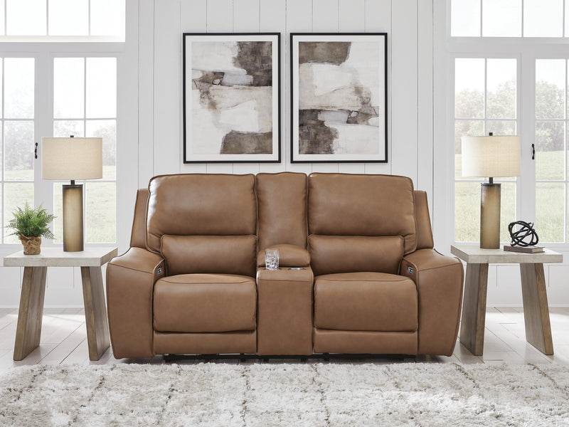 Ashley Furniture DeepWakes power reclining loveseat with console, showing plush upholstery and built-in cup holders for comfort and convenience.