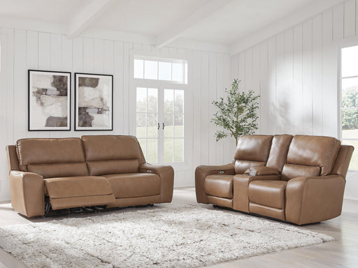 Ashley Furniture DeepWakes living room set with sofa and loveseat in a modern fabric, displayed in a stylish home setting.