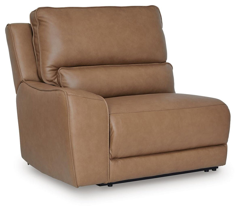 Ashley Furniture DeepWakes reclining sectional with storage console, shown in a stylish sectional layout with plush cushions.