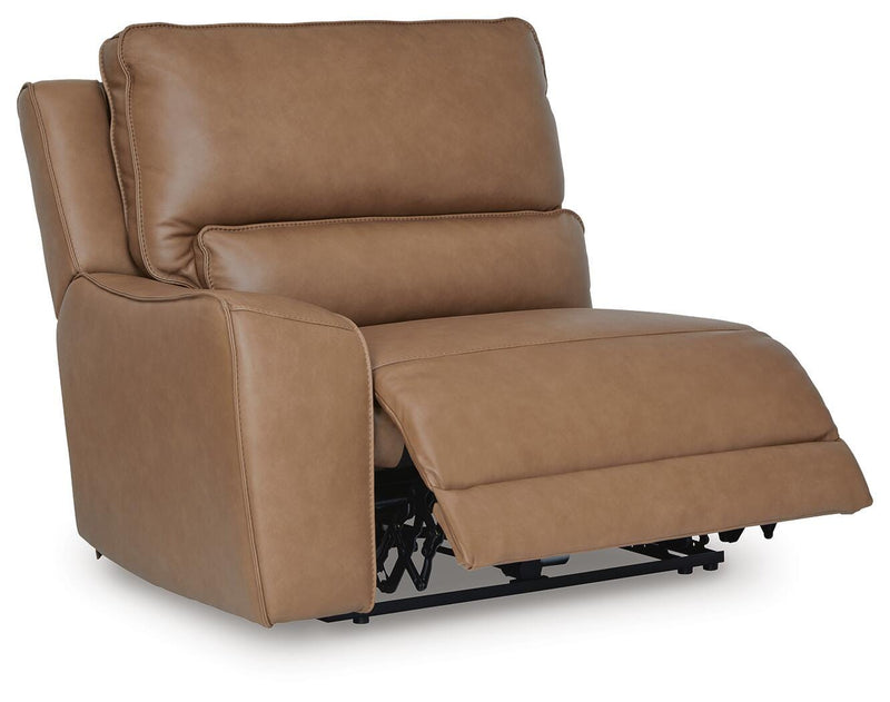 Ashley Furniture DeepWakes reclining sectional sofa chaise with plush cushions and a modern design, viewed from an angled open position.