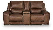 Ashley Furniture DeepWakes reclining living room set featuring plush cushions, a sofa and loveseat in a modern fabric finish.