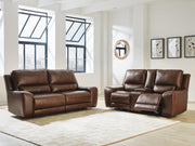 DeepWakes reclining living room set by Ashley Furniture, featuring plush cushions and a modern design for comfortable relaxation.