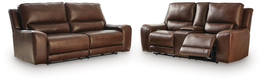Ashley Furniture DeepWakes reclining living room set with plush cushions and dark upholstery, shown from a front view.