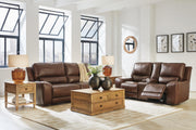 Ashley Furniture DeepWakes reclining living room set with plush fabric cushions and modern design, shown in a spacious living room.