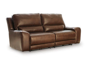 Ashley Furniture DeepWakes reclining living room set, view of the sofa with plush cushions and reclining features in a modern living space.