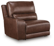 Ashley Furniture DeepWakes power reclining sectional with chaise, featuring plush cushions and a modern, comfortable design.