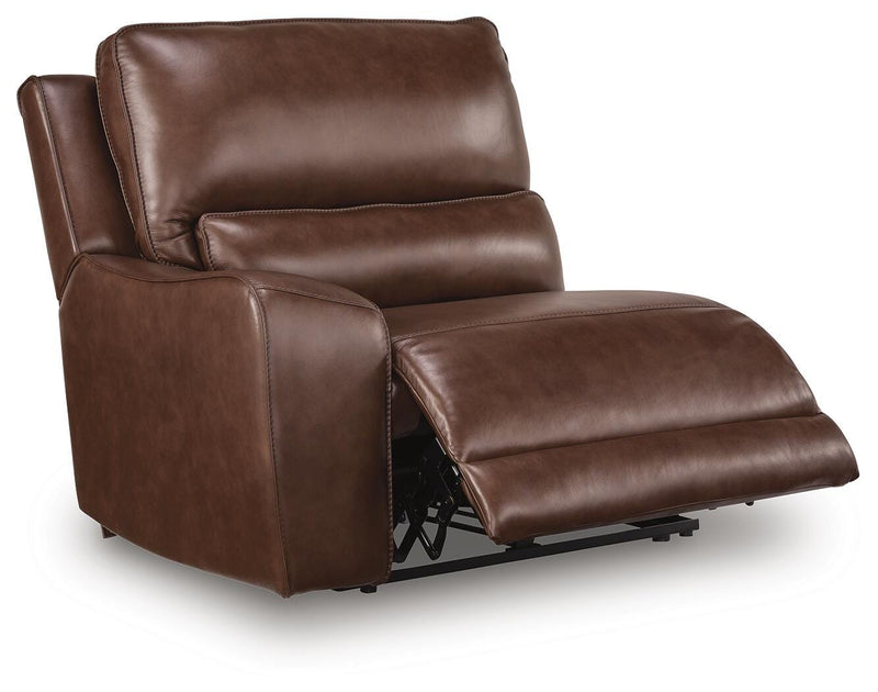 Ashley Furniture DeepWakes sectional reclining sofa chaise, shown from an angled open view highlighting the plush upholstery and reclining features.