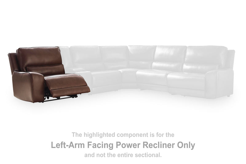 Ashley Furniture DeepWakes reclining sectional with storage console, featuring plush cushions and modern design in a living room setting.