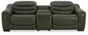 Ashley Furniture Center Line living room set with sofa, loveseat, and armchair in neutral fabric, arranged in a modern living space.