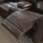Ashley Furniture Crossplex Living Room Set showing a modern sofa and matching armchair in a stylish living room arrangement