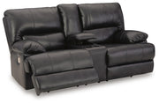 Ashley Furniture Mountainous Living Room Set with sectional sofa and matching chairs, showcasing a cozy, modern design in a stylish living space.