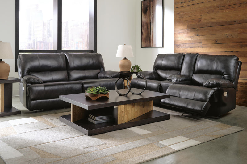 Ashley Furniture Mountainous Living Room Set featuring a sofa and armchair with plush cushions and stylish fabric upholstery.