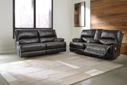 Ashley Furniture Mountainous Living Room Set with sofa and armchairs, featuring plush cushions and mountain-inspired design.