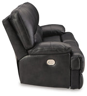 Ashley Furniture Mountainous Living Room Set featuring a sofa and armchair with plush cushions and mountain-inspired design details.